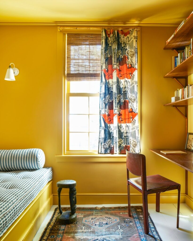 Image may contain Furniture Chair Shelf Living Room Room Indoors Rug Bedroom and Interior Design