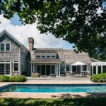 A shinglestyle summer home in the Hamptons renovated by Bellwether Architects fits in beautifully with the areas classic...