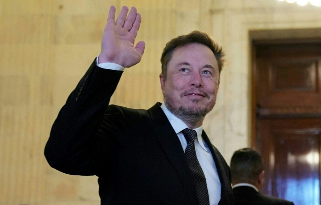 Elon Musk waving