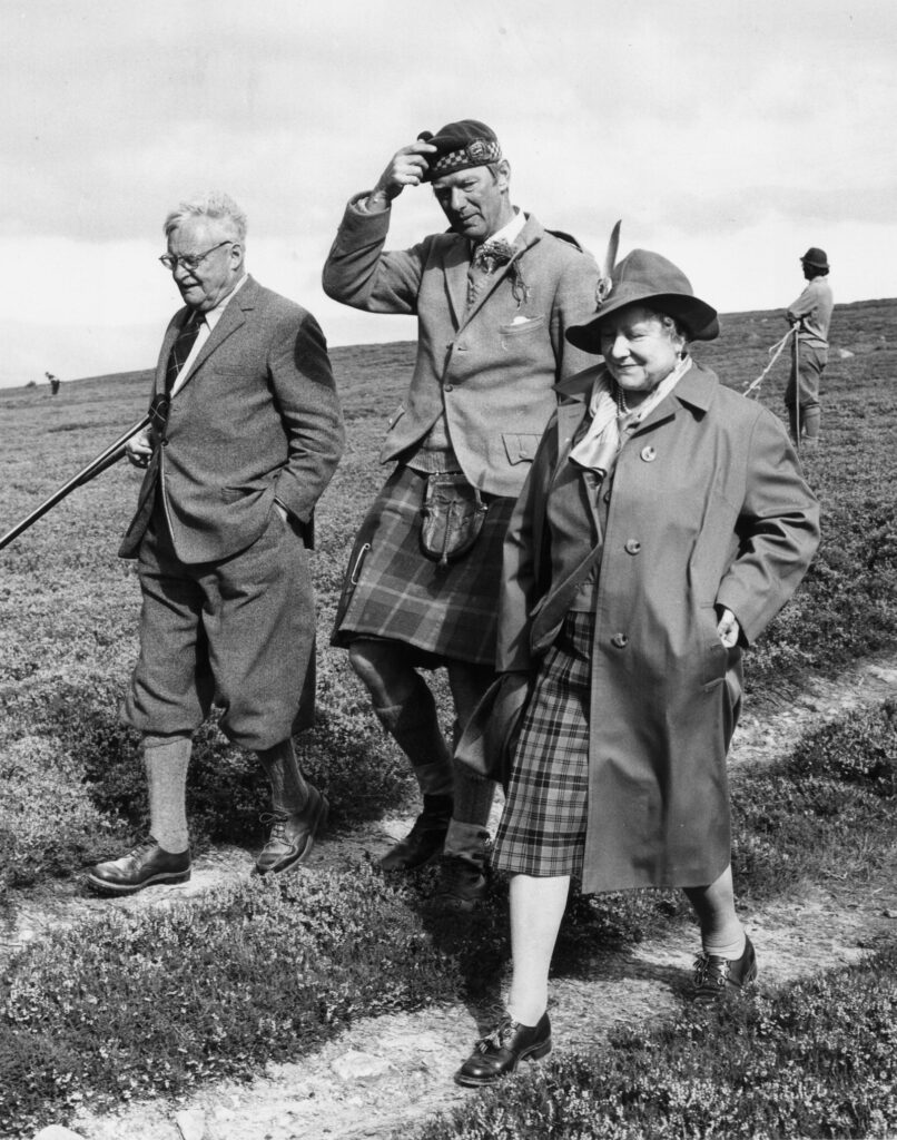 Elizabeth the Queen Mother attends the North of Scotland Gundog Association retriever trials at Balmoral in 1973.