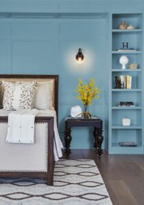 The blue hue envelops a bedroom when applied in an allover extent.