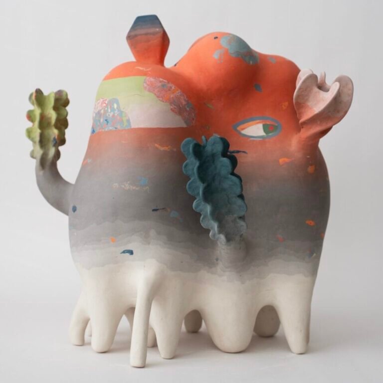 an abstract, colorful ceramic sculpture with nature-inspired elements evocative of coral or flowers