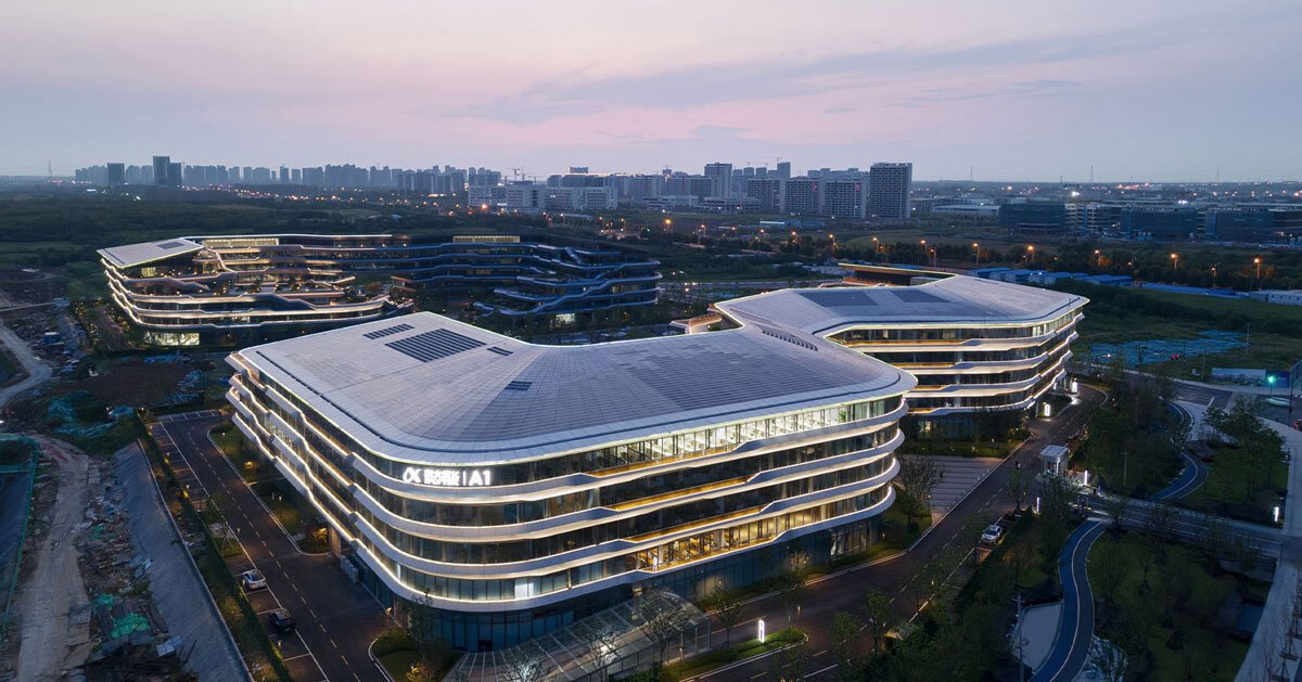 aluminum facade contrasts with organic garden in iFLYTEK AI headquarters by line+