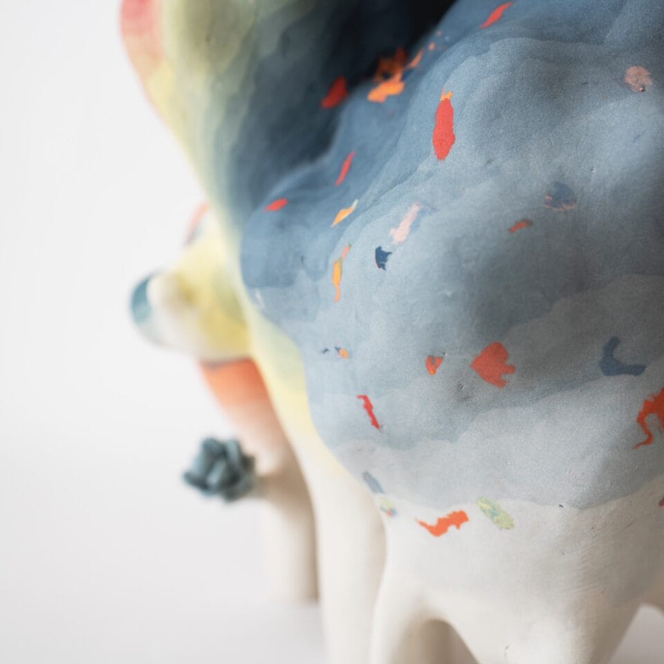 a detail of an abstract, colorful ceramic sculpture