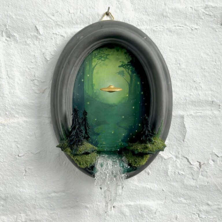 within a miniature ovoid frame, a detailed diorama depicts a landscape with a hovering UFO. a waterfall cascades over the bottom of the frame.