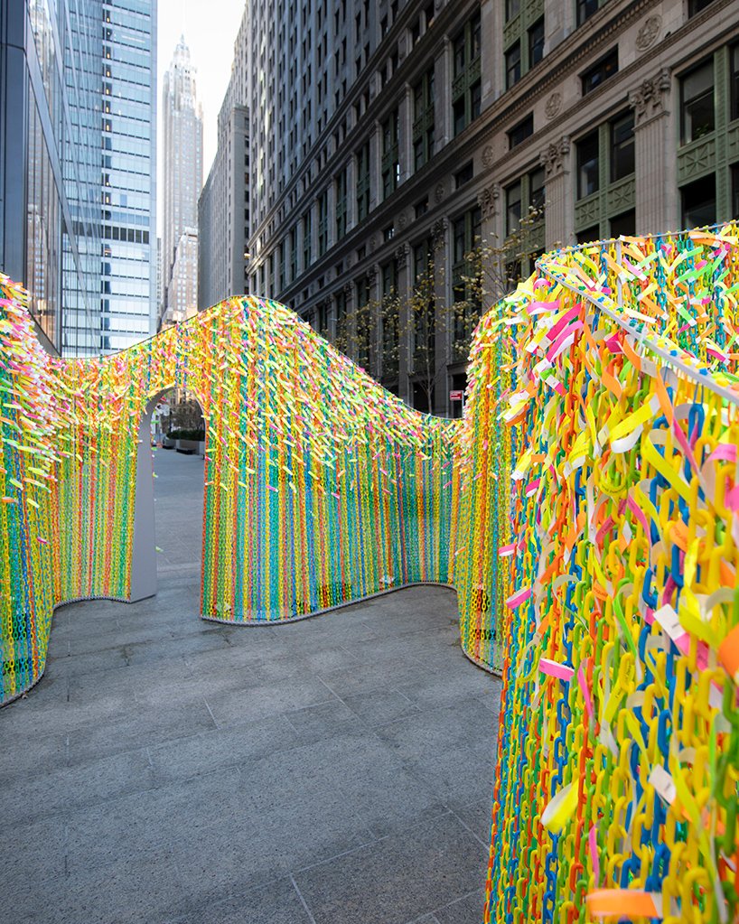 fluorescent wish ribbons coat hou de sousa's interactive pavilion in new york