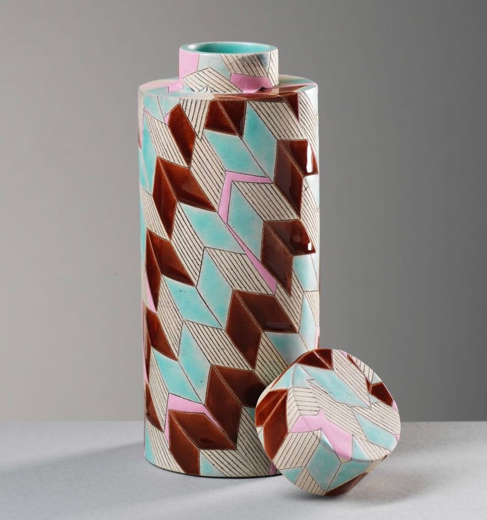 a geometrically patterned, cylindrical jar