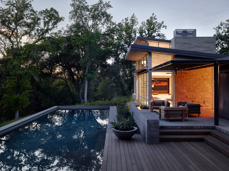 A 70-foot swimming pool and open-air dining spaces designed for relaxing, entertaining, and soaking in mountain sunsets.
