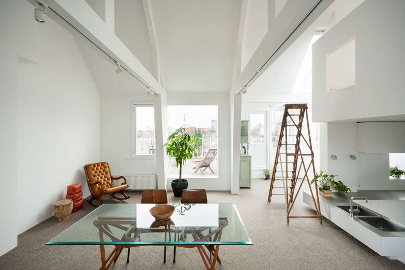 Bright white walls reflect every bit of natural light in this renovated Amsterdam duplex, creating a fresh, open atmosphere even on the gloomiest days.