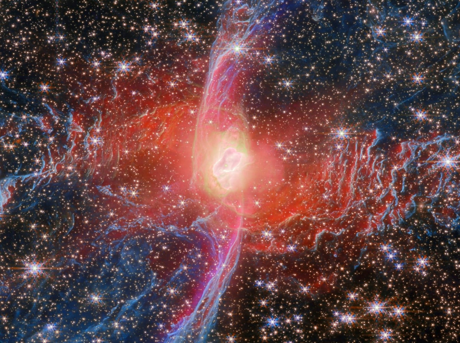 a detail of the bright nucleus star of the Red Spider Nebula, captured by the Webb space telescope