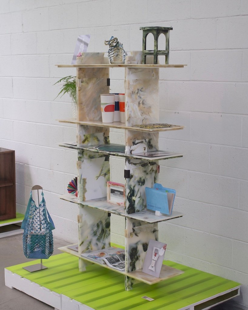 plastic marble display shelf turns upcycled materials into reconfigurable furniture