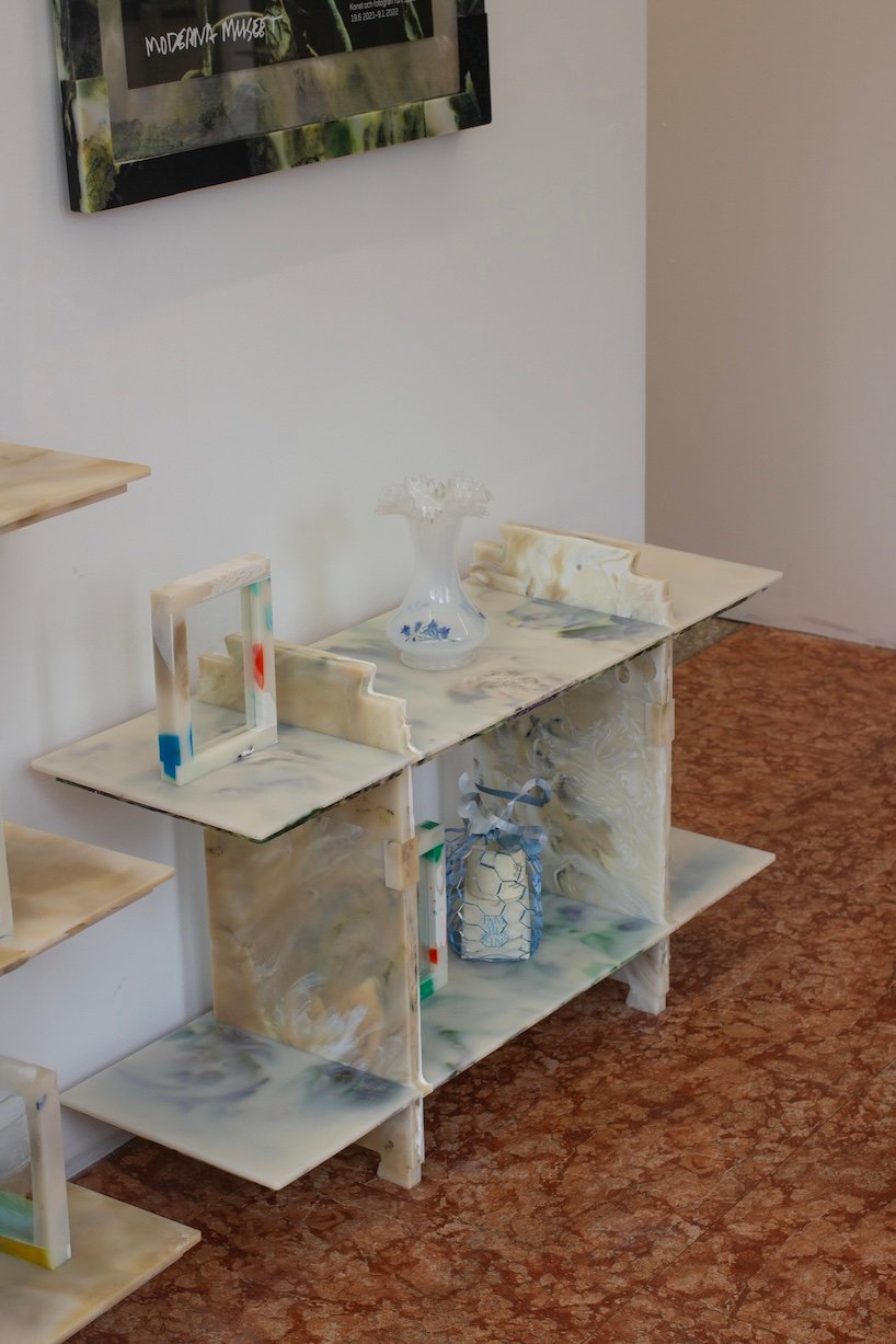 plastic marble display shelf turns upcycled materials into reconfigurable furniture