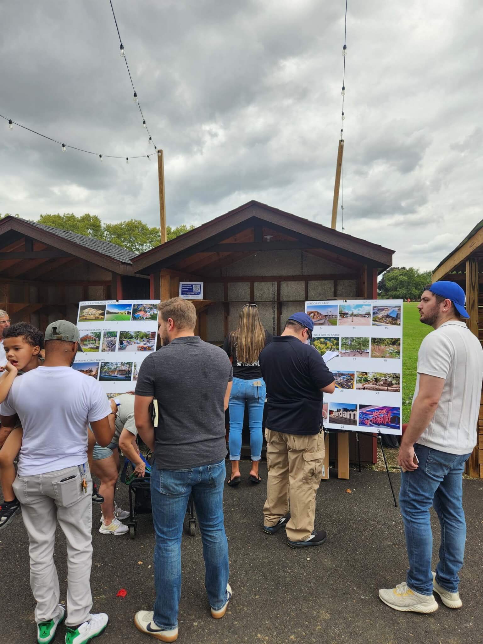 Community members collaborating on site mapping during a public session