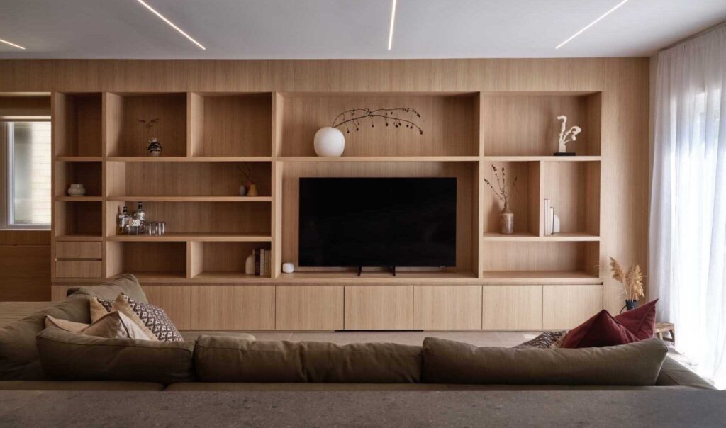 This Warm Wood Interior Completely Transformed a 1980s Builder Home