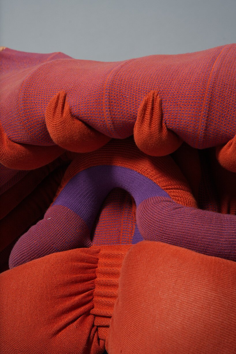 A flexible knit structure folding seamlessly around a body to create a temporary chair